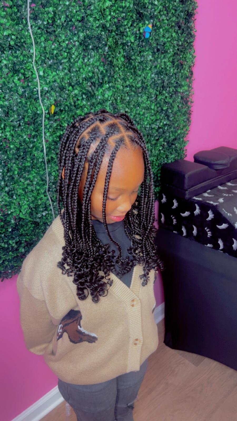 Kid's knotless bob braids with curled ends